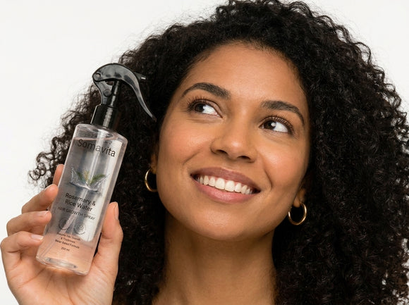 Woman holding the SomaVita scalp mist